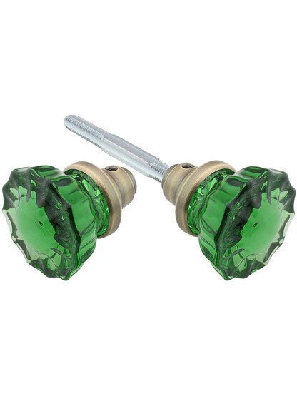 Pair of Emerald Fluted Crystal Glass Door Knobs in Antique Brass.